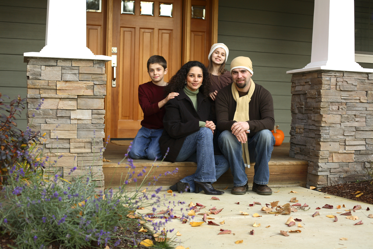 Family portrait on front porch